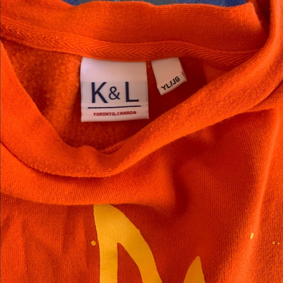 A reddish orange sweater - Picture 2 of 3